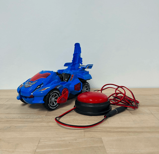 Blue and red car that transforms into a dinosaur